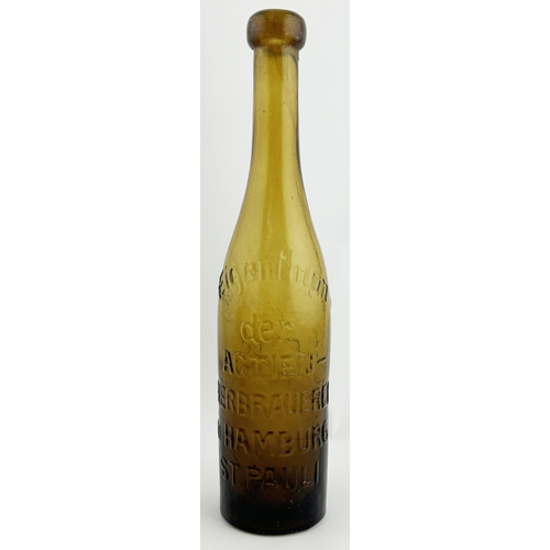 277 - HAMBURG BEER BOTTLE. 10.5ins tall. Heavily embossing to front & back, with t.m. to front. Some surfa... 