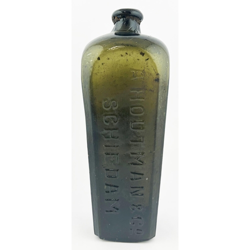 329 - SEALED GIN BOTTLE. 11ins tall. Embossed A HOUTMAN & CO/ SCHIEDAM. Chip to seal.