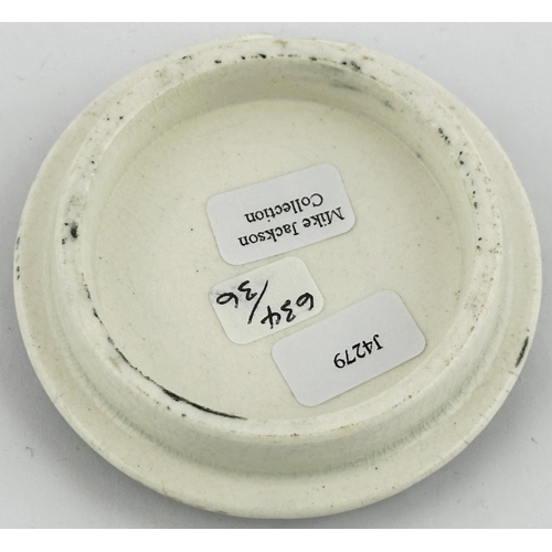 389 - LEAMINGTON POT LID. (APL pg 635,36) 2.5ins diam. Very dark black striking transfer with decorative l... 