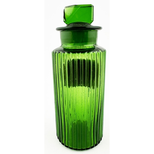 394 - PHARMACY SHOP ROUND BOTTLE. 6.8ins tall. Bright green glass, circular, vertical ribs all round. Wide... 