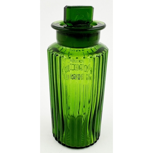 395 - PHARMACY SHOP ROUND BOTTLE. 5.3ins tall. Bright green glass, circular, vertical ribs all round. Wide... 