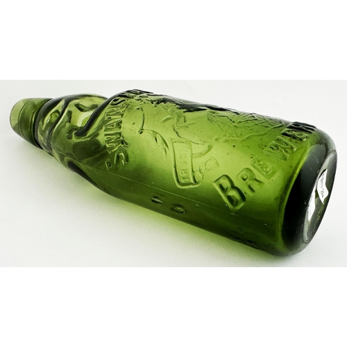 407 - SWANSEA UNITED BREWERIES CODD BOTTLE. 8.6ins tall, strong, mid green glass, 10oz capacity. A superb,... 