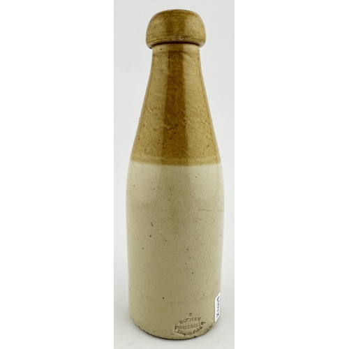 423 - W H WOOD DURHAM & SUNDERLAND GREEN GINGER BEER BOTTLE. 8ins tall, ch., t.t., screw top. Attractive D... 