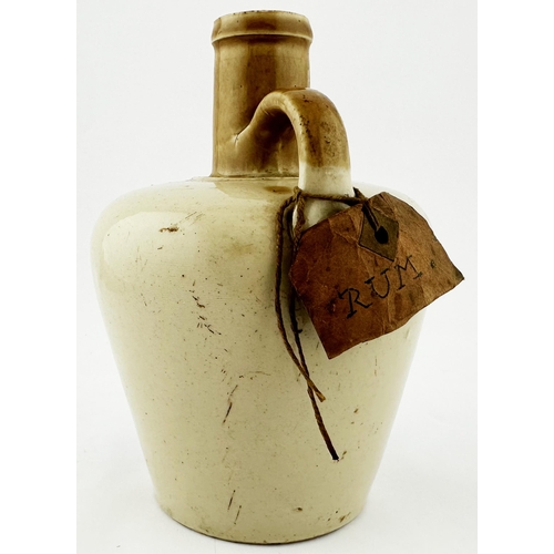 436 - DUBLIN OLD IRISH WHISKY JUG. 6.8ins tall. Tan top, cork closure, neck & rear handle. Strong blue tra... 