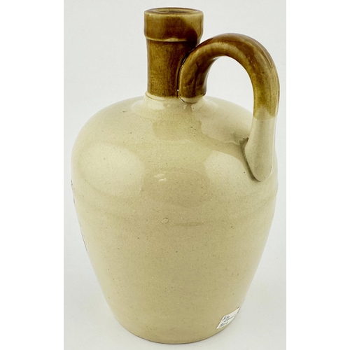 439 - RAMSAYS SUPERIOR SCOTCH WHISKY JUG. WG p155. 7.4ins tall. Tan neck & rear handle. Very strong black ... 