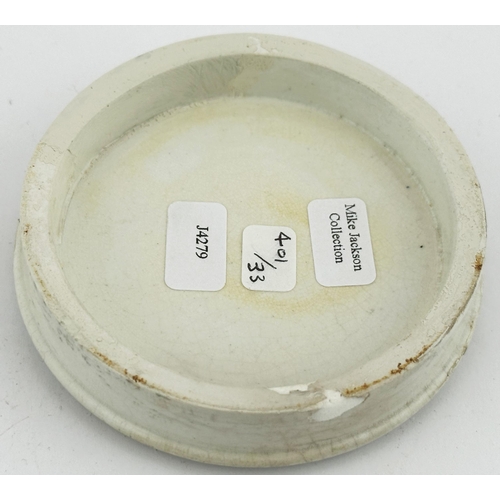 486 - LONDON ARECA NUT TOOTH PASTE POT LID. (APL pg 401, 33) 3.1ins diam. Black transfer on yellow backgro... 