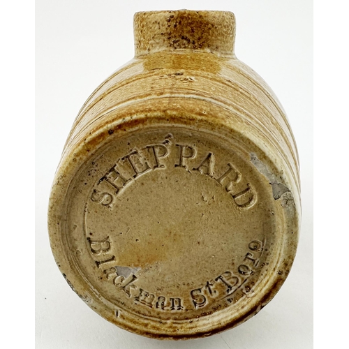 463 - LONDON BARREL SHAPE HIP FLASK. 3.9 ins tall. Dinky small size salt glaze barrel shape spirit flask, ... 