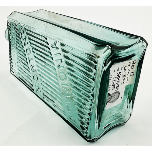 509 - MORTONS AMMONIA POISON BOTTLE. (DP p126). 8.1ins tall. A truly chunky deep aqua glass bottle. Rectan... 