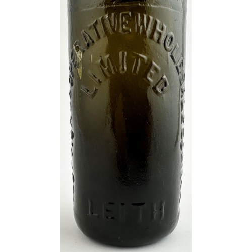 539 - SCOTTISH COOPERATIVE WHOLESALE SOCIETY BLACK GLASS CODD BOTTLE. 9ins tall. Dense black/ very dark ol... 