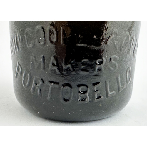 539 - SCOTTISH COOPERATIVE WHOLESALE SOCIETY BLACK GLASS CODD BOTTLE. 9ins tall. Dense black/ very dark ol... 