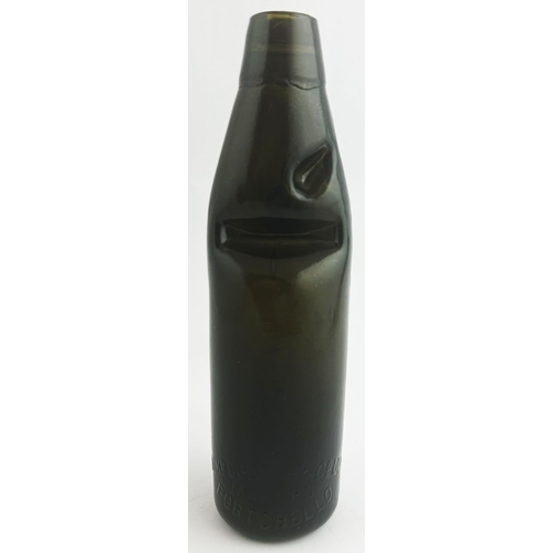 539 - SCOTTISH COOPERATIVE WHOLESALE SOCIETY BLACK GLASS CODD BOTTLE. 9ins tall. Dense black/ very dark ol... 