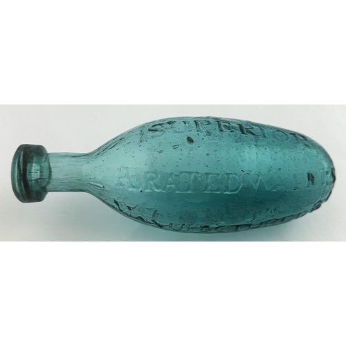 544 - EARLY BOMBAY HAMILTON BOTTLE . 7.8ins long. An outstanding, very early, cross hinge base mould, hami... 