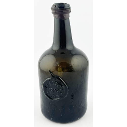 560 - 1802 SEALED DATED ENGLISH WINE BOTTLE. 11ins tall. Black/ dark green glass mallet, double collar lip... 