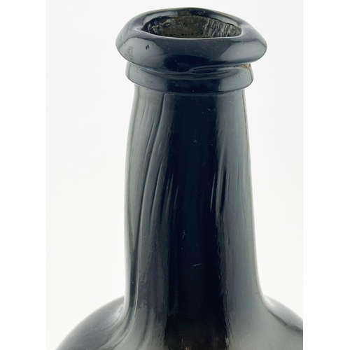 561 - 1815 SEALED DATED ENGLISH WINE BOTTLE. 11ins tall. Black/ dark green glass cylinder, crude double co... 