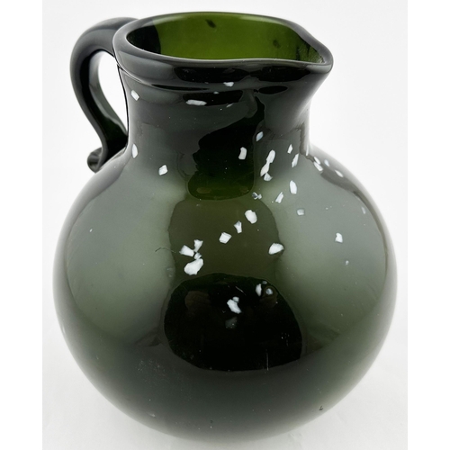 562 - NAILSEA TYPE HANDLED JUG. 7.8 ins tall. Very dark green/ black glass wide mouthed jug (refinished li... 