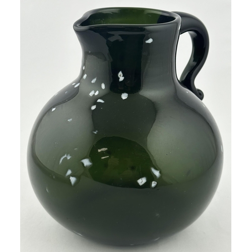 562 - NAILSEA TYPE HANDLED JUG. 7.8 ins tall. Very dark green/ black glass wide mouthed jug (refinished li... 