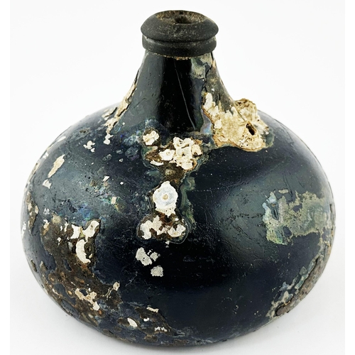 563 - ENGLISH SEALED & DATED ONION WINE BOTTLE. 5.4 ins. tall. Barnacle covered professionally reconstruct... 