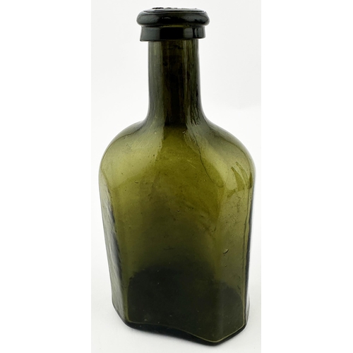 565 - ENGLISH FREEBLOWN UTILITY BOTTLE. 5 ins tall. Very dark green/ black glass. Rectangular base, facett... 