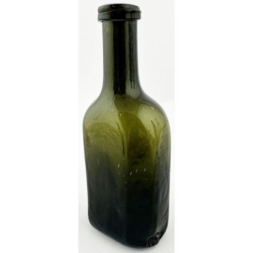 566 - ENGLISH FREEBLOWN UTILITY BOTTLE. 6 ins tall. Very dark green/ black glass. Rectangular base, facett... 