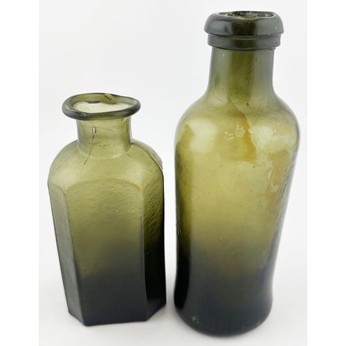 567 - PAIR OF EARLY UTILITY BOTTLES. Tallest 7.5 ins tall. An interesting duo of dark green freeblown bott... 