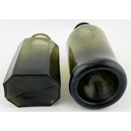 567 - PAIR OF EARLY UTILITY BOTTLES. Tallest 7.5 ins tall. An interesting duo of dark green freeblown bott... 