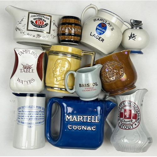 300 - PUB JUG GROUP. Various. Inc. Table Waters, cigarettes, lager plus match striker & match holder. Some... 