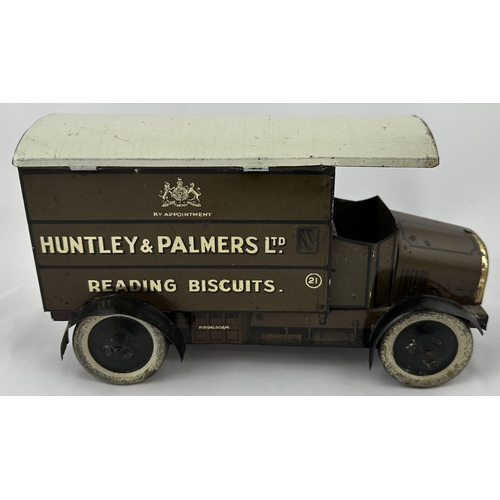 38 - HUNTLEY & PALMERS BISCUITS TIN LORRY. 9.5ins long. Lithographed four wheeled, open fronted, lettered... 