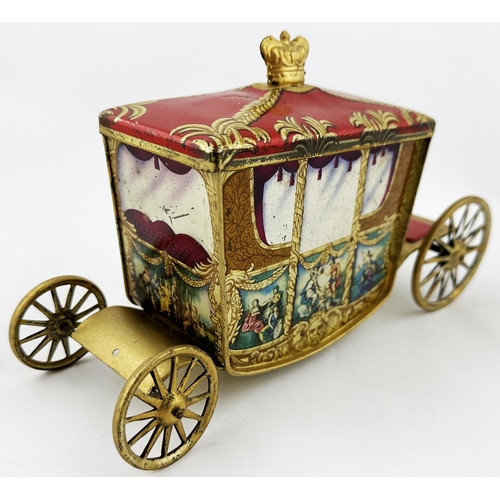 39 - W R JACOB CORONATION COACH. 9ins long. Multi coloured lithographed, four wheeled, Royal coach biscui... 