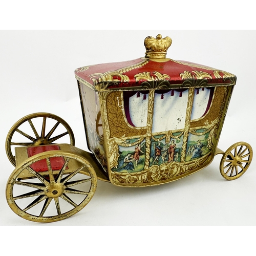 39 - W R JACOB CORONATION COACH. 9ins long. Multi coloured lithographed, four wheeled, Royal coach biscui... 