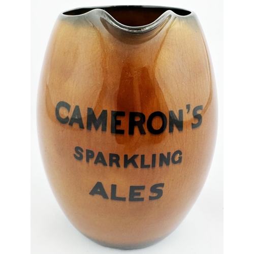 63 - CAMERONS SPARKLING ALES JUG. 5.9ins tall. Dark brown rim and bottom, lighter brown central glaze. Bl... 