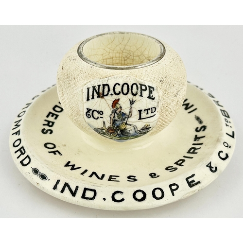 100 - IND COOPE ASHTRAY, STRIKER & MATCHOLDER. 3ins tall. Multi coloured Britannia plaque each side of str... 