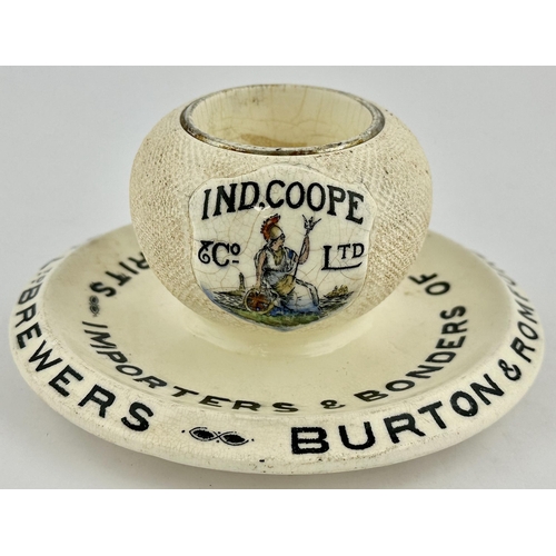 100 - IND COOPE ASHTRAY, STRIKER & MATCHOLDER. 3ins tall. Multi coloured Britannia plaque each side of str... 