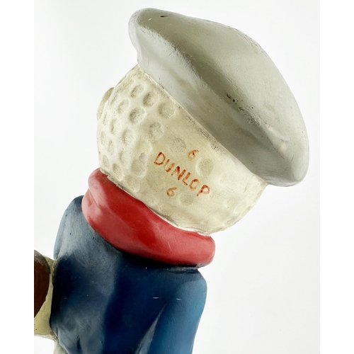 107 - DUNLOP GOLF BALLS GOLFER ADVERTISING FIGURE. 15.5in s tall. Painted plaster of Paris golfer (head in... 