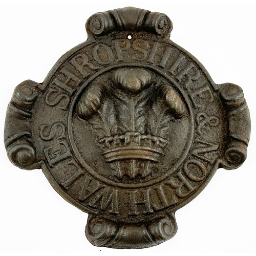 116 - SHROPSHIRE & NORTH WALES CAST IRON INSURANCE MARK. 9.5ins tall. Four scrolls to perimeter, fluer de ... 