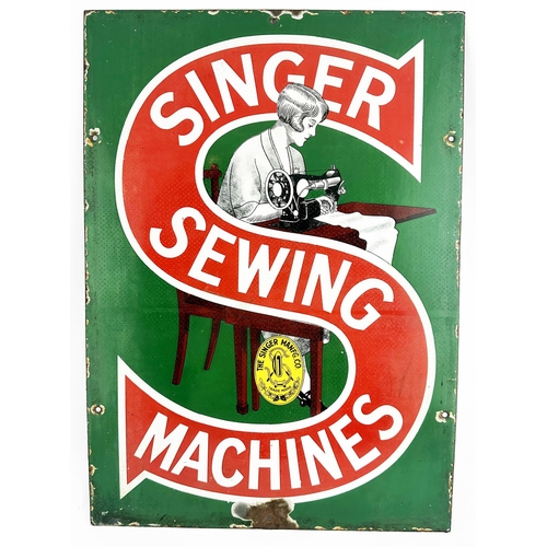 70 - SINGER SEWING MACHINES ENAMEL SIGN. 21 x 15ins. A great pictorial enamel sign featuring detailed lad... 