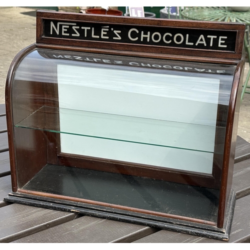 89 - NESTLES CHOCOLATE DISPLAY CABINET. 16.1 high, 20.5 wide, 7.9ins deep. Very attractive curve fronted ... 