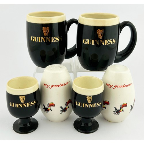 51 - GUINNESS KITCHEN ASSORTMENT ITEMS. Tallest tankard 3.6ins. 2 tankards, 2 egg cups, plus salt and pep... 