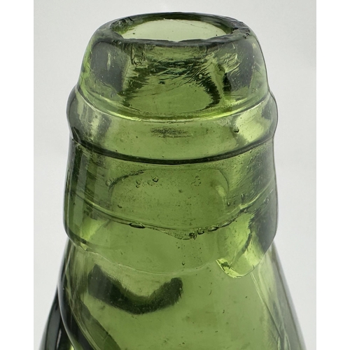 10 - SCHOLES BRIDGE WIGAN ELEPHANT PICTORIAL CODD BOTTLE. 9.1ins tall. 10oz mid moss green coloured stand... 