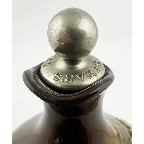 101 - HES A JOLLY GOOD FELLOW KINGSWARE WHISKY FLASK. 8.5ins tall to stopper top. Shiny dark brown body, r... 