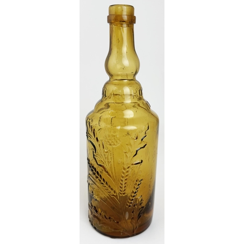 102 - LEITH THISTLE WHISKY BOTTLE. 10.5ins tall. A truly stand out golden amber bottle. Straight sided two... 