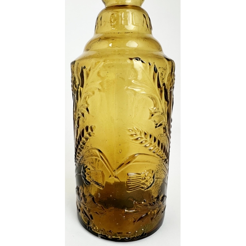 102 - LEITH THISTLE WHISKY BOTTLE. 10.5ins tall. A truly stand out golden amber bottle. Straight sided two... 