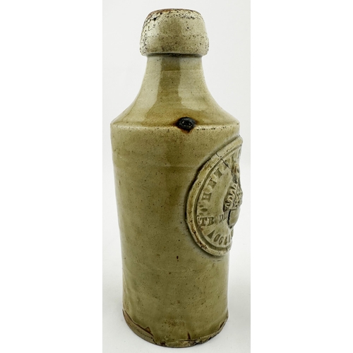 138 - ACCRINGTON SLAB SEALED GINGER BEER. 7ins tall. Very crude hand thrown stoneware ginger beer shape, b... 