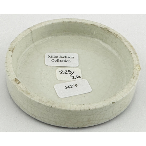 151 - LOUGHBOROUGH POT LID. (APL pg 229, 26) 2.6ins diam. Black transfer with AD border with inner solid r... 