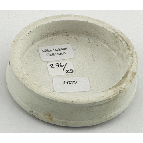 156 - SCUNTHORPE POT LID. (APL 236, 29) 2.5ins diam. Maybe only one known as this matches picture in APL. ... 