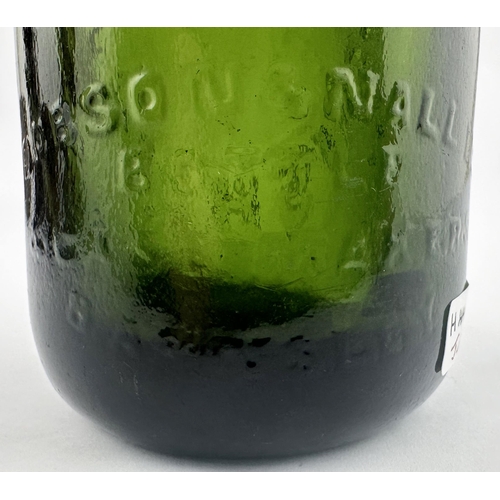 17 - J W BRIGHT RUSHDEN GREEN GLASS CODD BOTTLE. 9.1ins tall. Dark green 10oz standard codd heavily embos... 