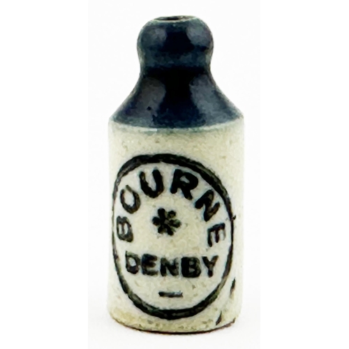 24 - TWO TONE MINIATURE BOURNE DENBY GINGER BEER BOTTLE. 0.8ins tall. T.t., st, black transfer, strong da... 