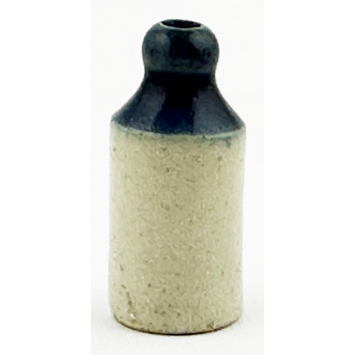 24 - TWO TONE MINIATURE BOURNE DENBY GINGER BEER BOTTLE. 0.8ins tall. T.t., st, black transfer, strong da... 