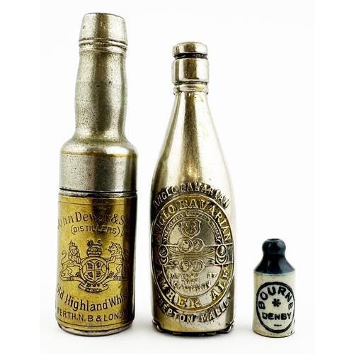 27 - PLATED BRASS BOTTLE-SHAPED MATCH SAFE ADVERTISING BOTTLE. 2.7ins tall. Heavily embossed across front... 