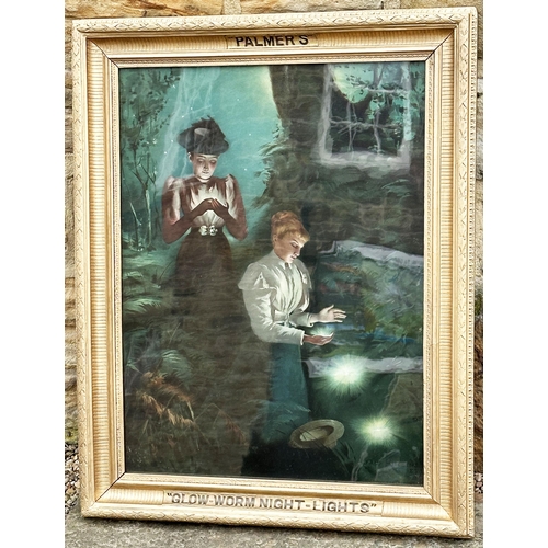 32 - PALMERS NIGHT LIGHTS FRAMED ADVERT. 22.5 x 28.5ins. Image of two ladys holding night lights in the d... 