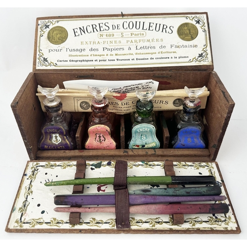 5 - FRENCH INKS DISPLAY BOX. 3.5 x 8.25ins. Presentation box of four French perfumed inks in wooden disp... 